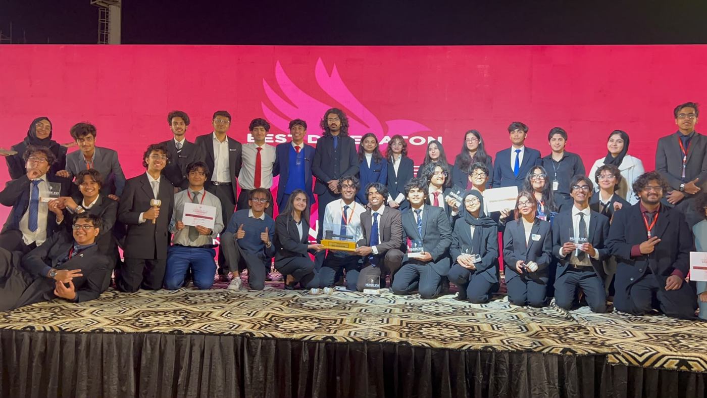 An MUN Society Pakistan delegation with the Best Delegation award at MUNIK, January 2026.
