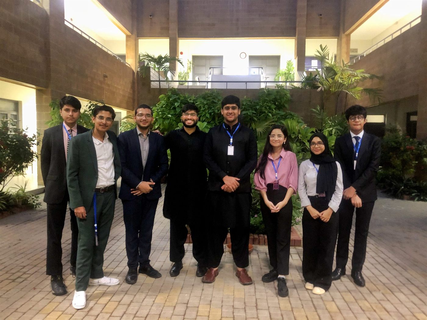 An MUN Society Pakistan delegation photographed together at MUNIK, Institute of Business Administration Karachi.